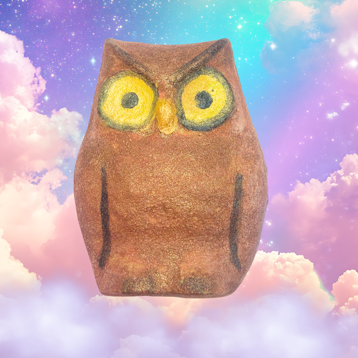 owl bath bomb brown with yellow eyes and scented in pacific crest trail