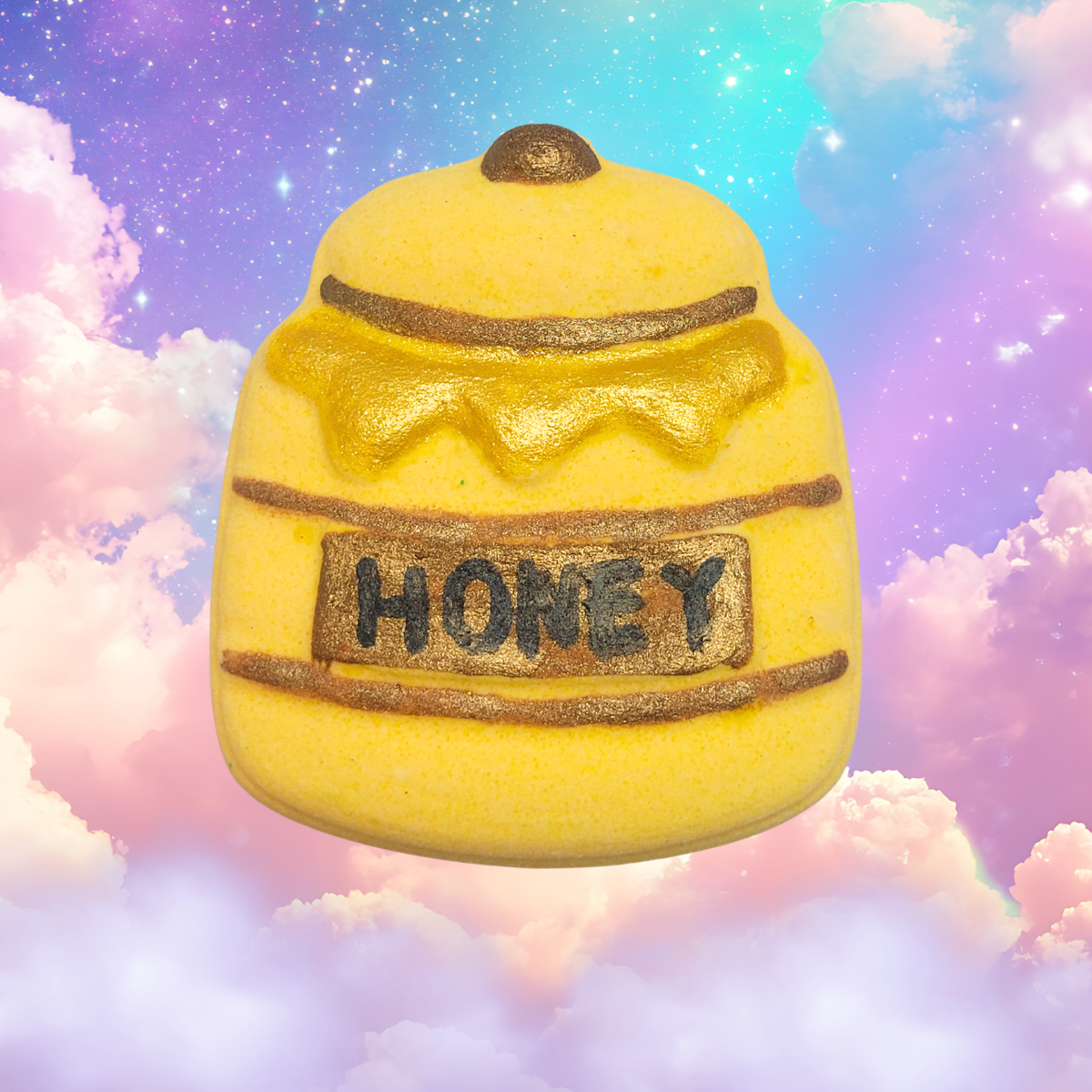 Yellow honey jar with brown details and honey written on the label with honey dripping down the front scented in honey and lemon sugar.