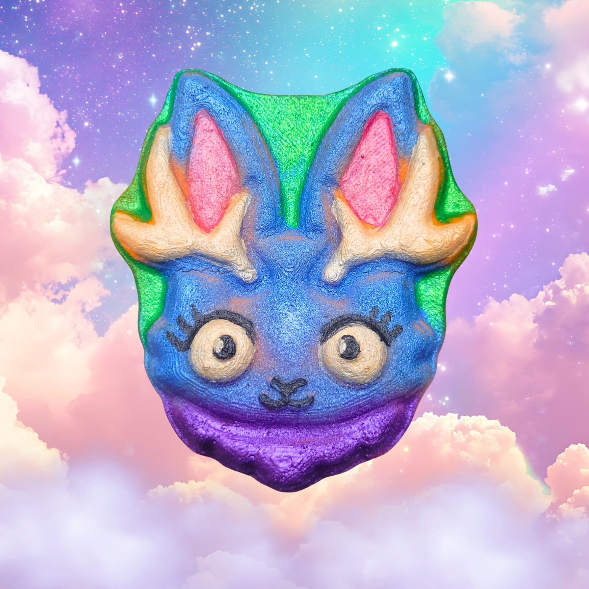 jackalope bath bomb that is blue and purple with a green border and is kawaii style scented with blood orange